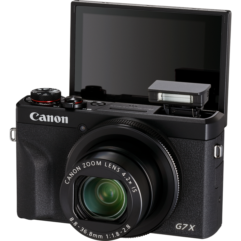 Vista frontal de producto con flash abierto del kit para vloggers premium de Canon PowerShot G7 X Mark III Premium, negro