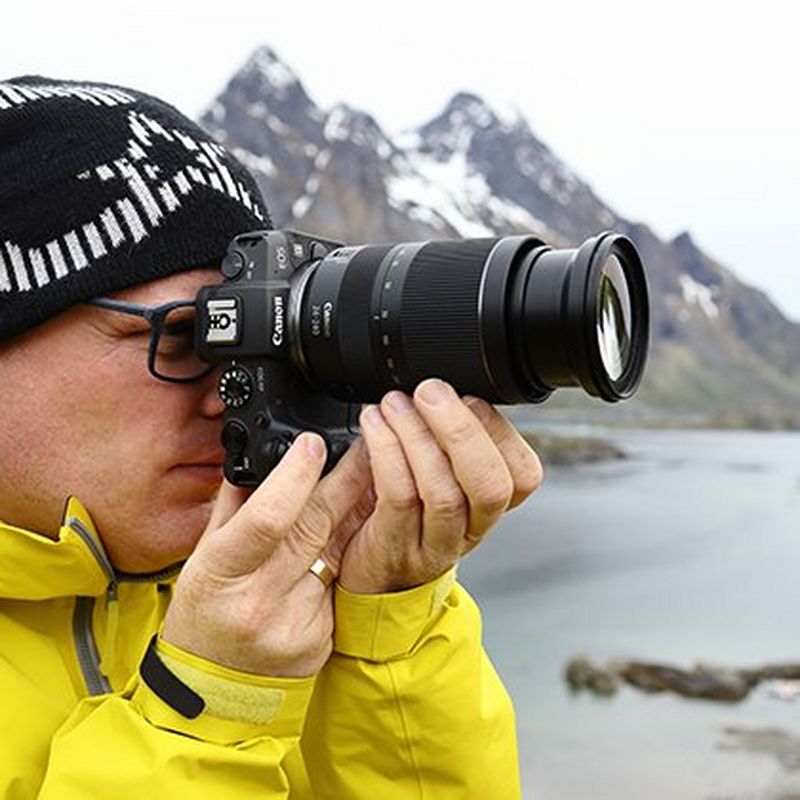 Canon RF 24-240mm F4-6.3 IS USM Lens A Man Holding a Camera to His Face