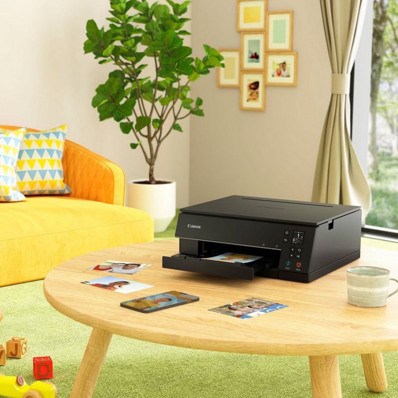 Canon PIXMA TS6350 Wireless Colour All in One Inkjet Photo Printer, Black Kept On A Table With Paper Tray Out