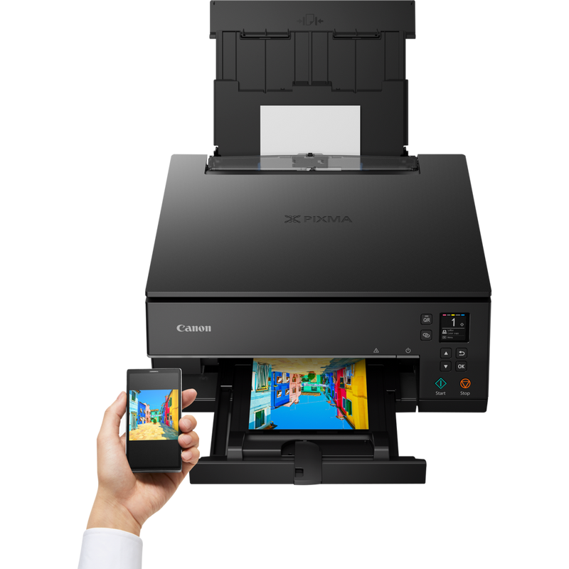 Canon PIXMA TS6350 Wireless Colour All in One Inkjet Photo Printer, Black Product Front View With A Person Printing From a Smartphone