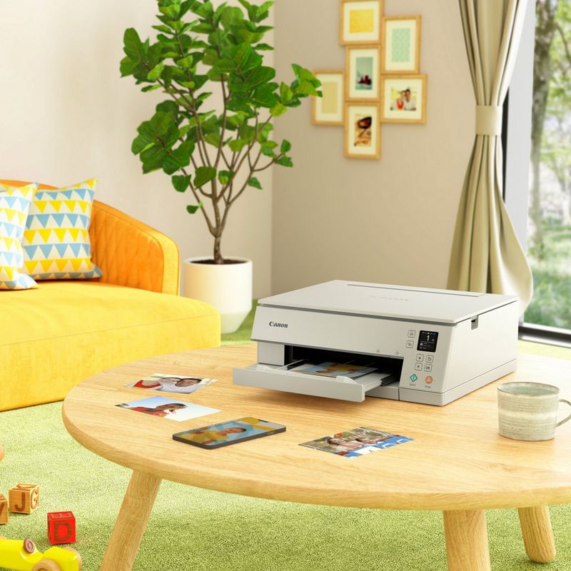 Canon PIXMA TS6351 Wireless Colour All in One Inkjet Photo Printer, White Kept On A Table With Paper Tray Out
