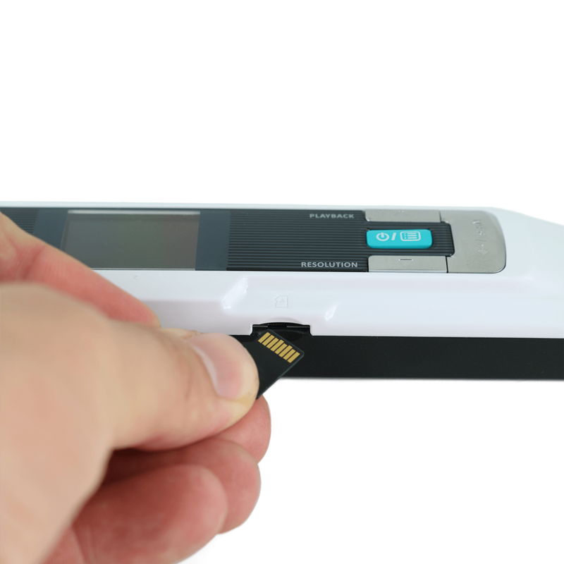 IRIScan Book 3 Handheld Scanner Product Side view with hand inserting memory card