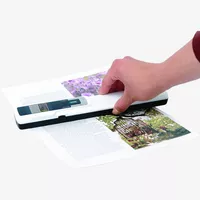 Escáner portátil IRIScan Book 3 Producto Producto en una mano en uso