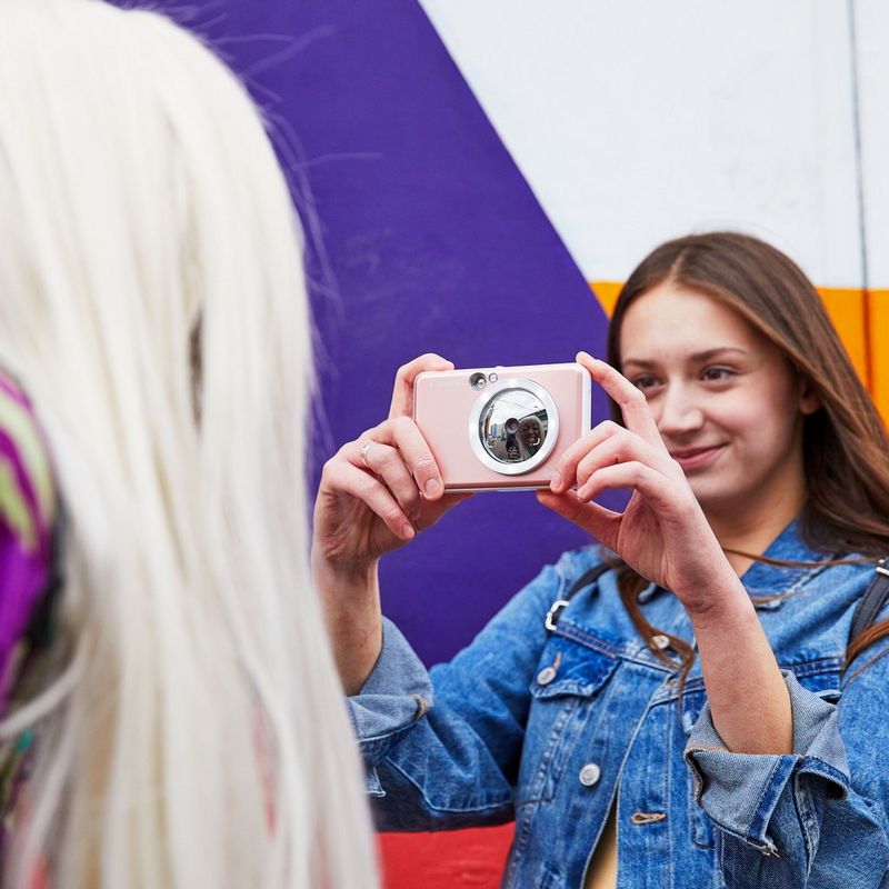 Canon Zoemini S Instant Camera Colour Photo Printer, Rose Gold Women clicking photo