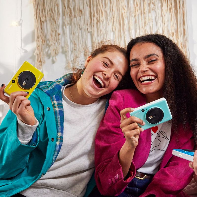 Canon Zoemini C Instant Camera Colour Photo Printer, Bumblebee Yellow 2 Girls posing with the camera