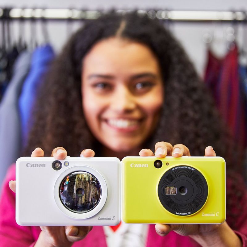 Canon Zoemini C Instant Camera Colour Photo Printer, Bumblebee Yellow Girl posing with 2 Printers