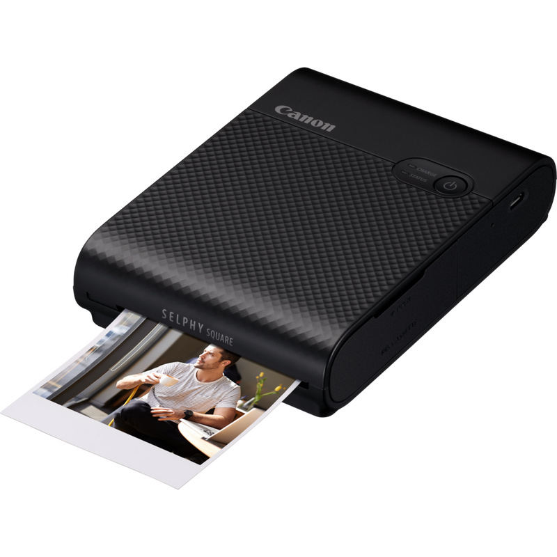 Canon SELPHY SQUARE QX10 Portable Colour Photo Wireless Printer, Black Product Front view with Print Out