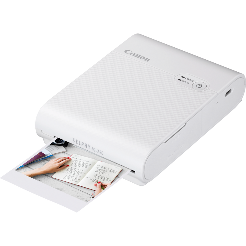 Canon SELPHY SQUARE QX10 Portable Colour Photo Wireless Printer Premium Kit, White Product Left Slanted View with Printout