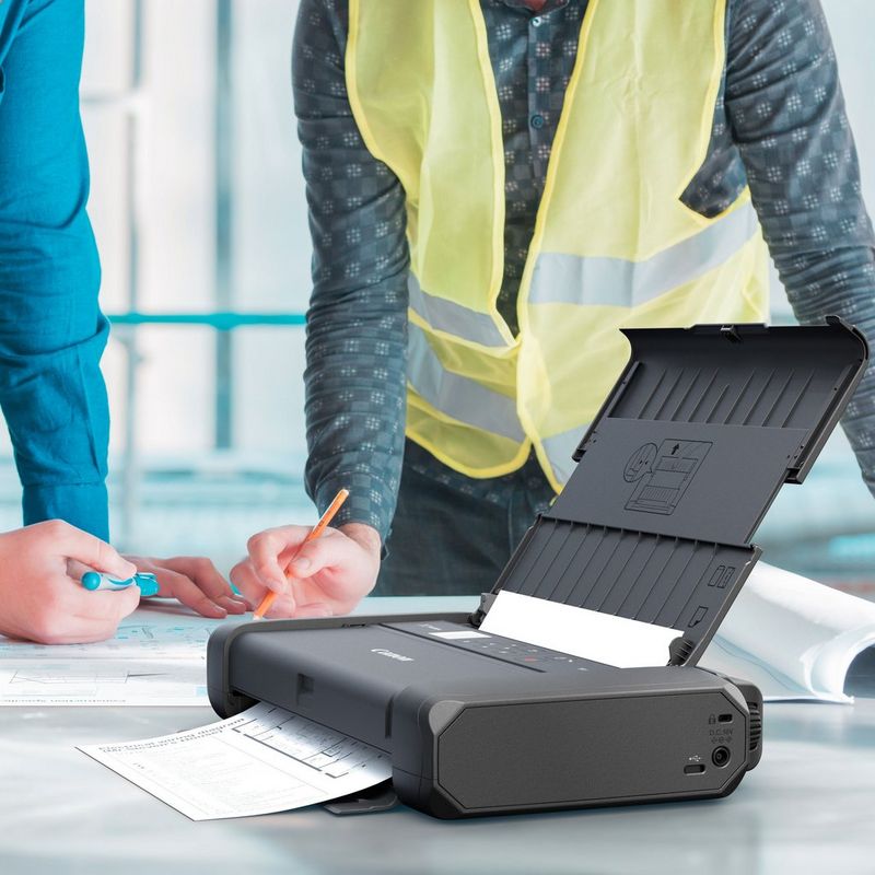 Canon PIXMA TR150 Portable Inkjet Printer with Battery Kept On A Table With Paper Tray Out