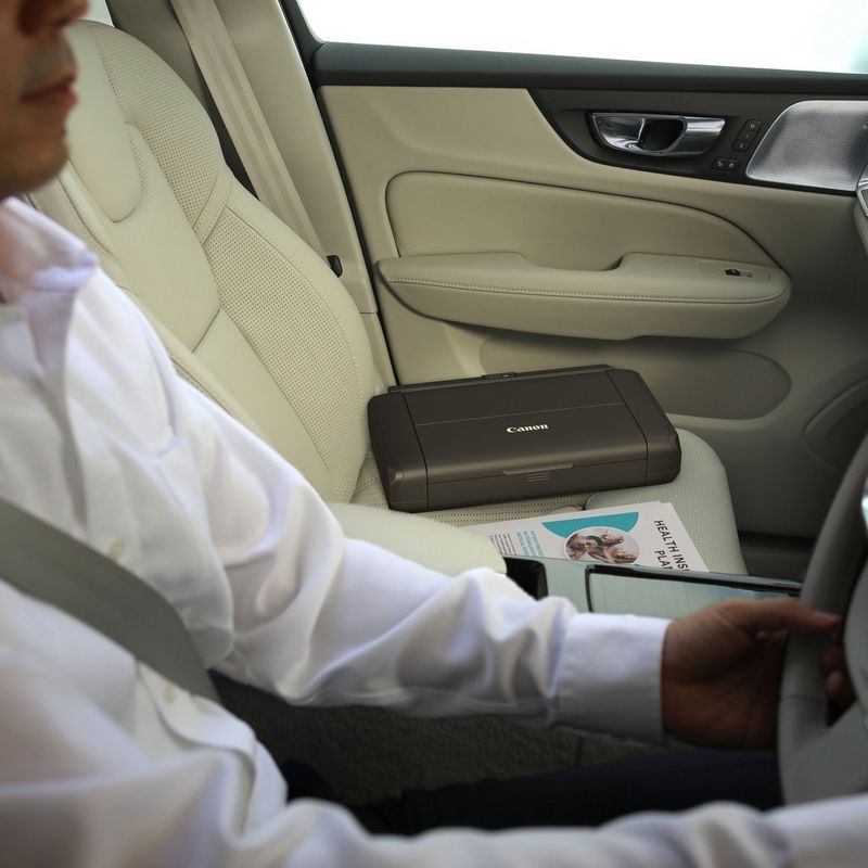 Canon PIXMA TR150 Portable Inkjet Printer with Battery Kept On A Car Seat