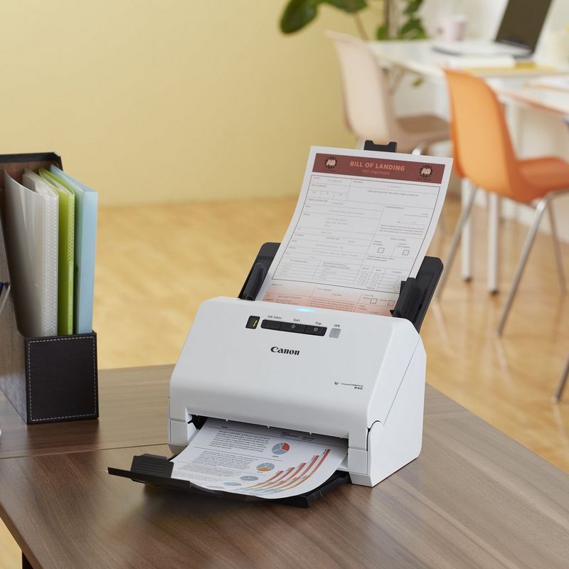 Canon imageFORMULA R40 Desktop Scanner Product Scanner on Desk with Files