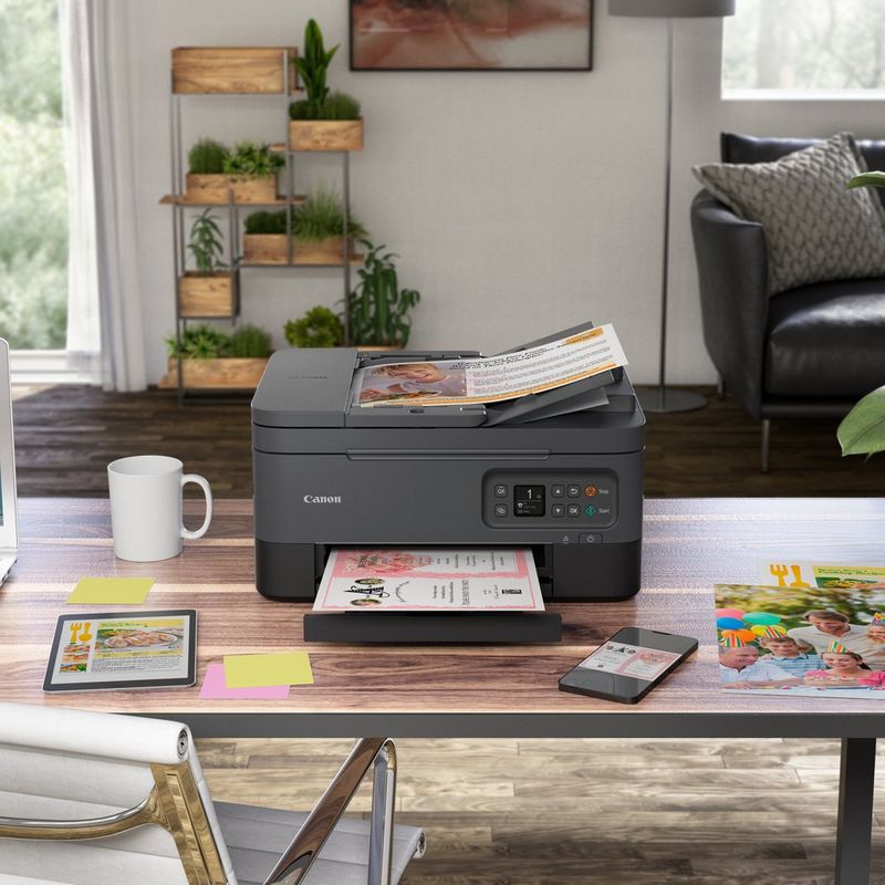 Canon PIXMA TS7450 Wireless Colour All in One Inkjet Photo Printer, Black Kept On A Table With Paper Tray Out