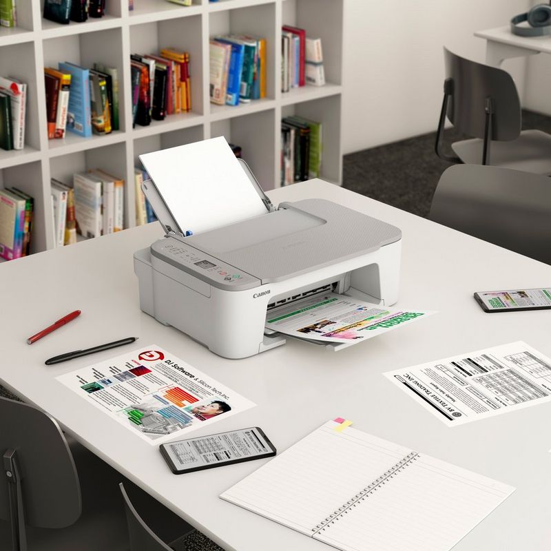 Canon PIXMA TS3451 Wireless Colour All-in-One Inkjet Photo Printer, White Kept On A Table With Paper Tray Out And Paper Support