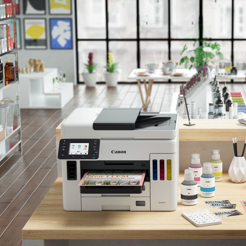Canon MAXIFY GX7050 Wireless Colour All-in-one Refillable MegaTank Inkjet Printer Kept On A Table With Paper Tray Out