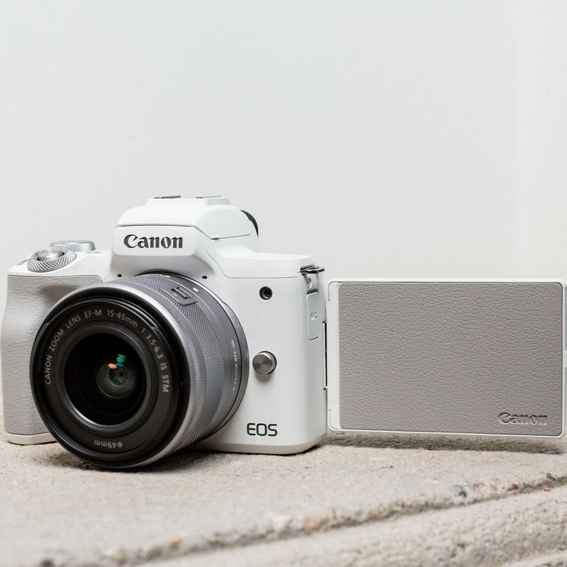 Canon EOS M50 Mark II Mirrorless Camera, White + EF-M 15-45mm f/3.5-6.3 IS STM Lens, Silver The Camera on a Cloth