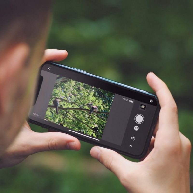 Canon PowerShot ZOOM Telephoto Monocular Compact Camera Essential Kit, Black Photo synced on a mobile