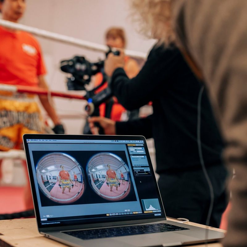 Canon RF 5.2mm F2.8L DUAL FISHEYE Lens A Laptop Screen Showing Side-by-Side Images