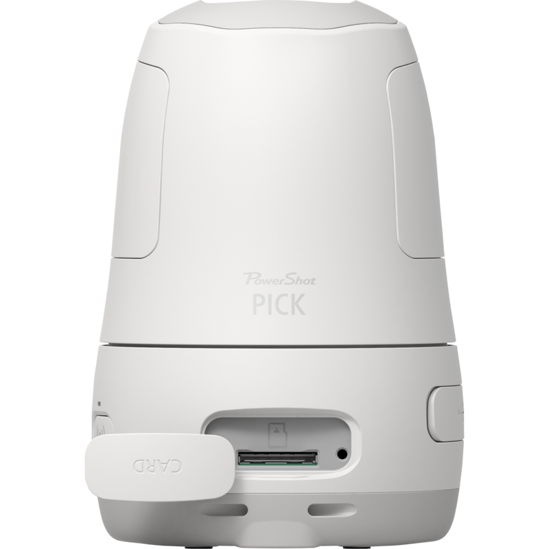 Canon PowerShot PX Compact Concept Camera Essential Kit, White camera on a dining table