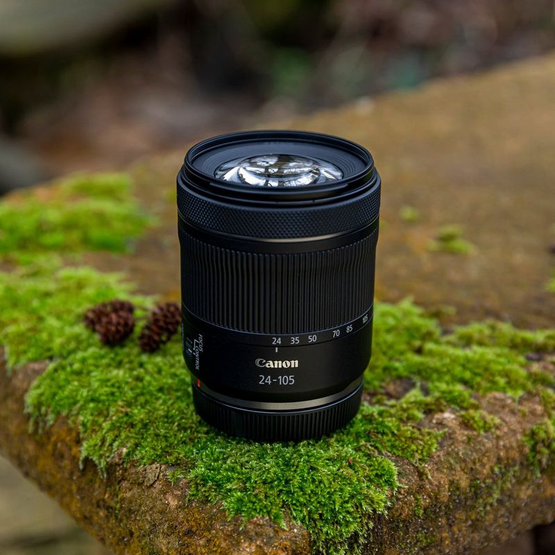 Canon EOS R8 Mirrorless Camera + RF 24-105mm F4-7.1 IS STM Lens Lens placed on a rocky table