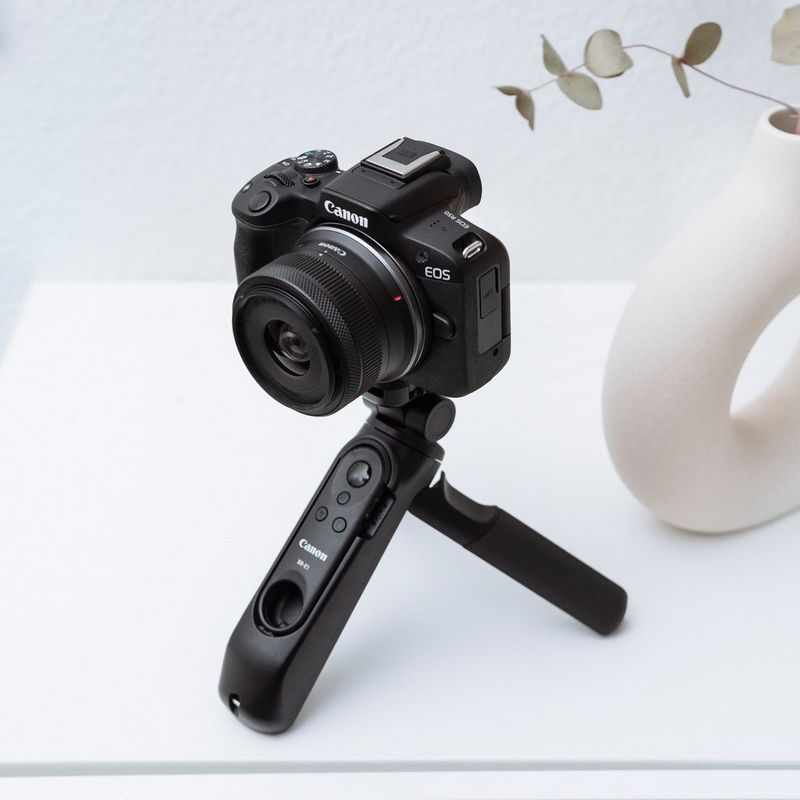 Canon EOS R50 Mirrorless Camera, Black and RF-S 18-45mm F4.5-6.3 IS STM Lens Product attached to a Tripod