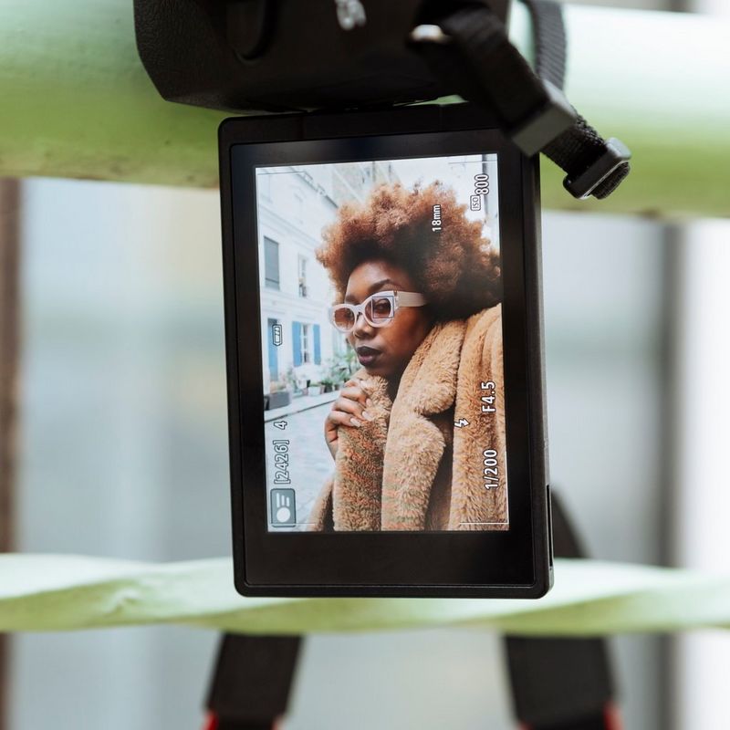 Canon EOS R50 Mirrorless Camera, Black + RF-S 18-45mm IS STM Lens + RF-S 55-210mm IS STM Lens Display Open