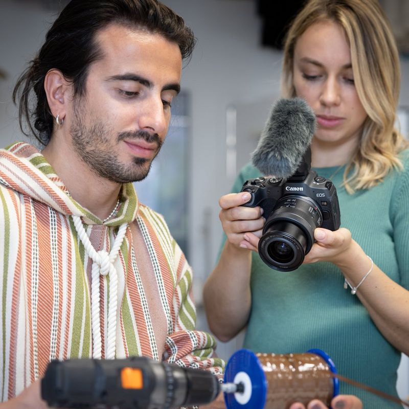 RF 24-50mm F4.5-6.3 IS STM Lens Lifestyle photo of a women vlogging