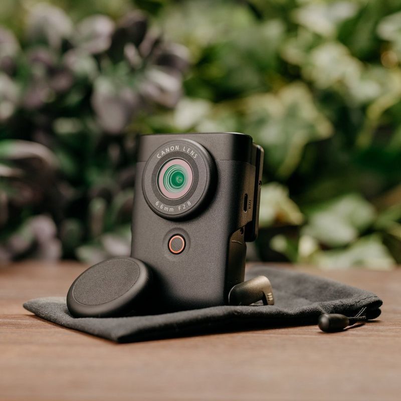 Product with stand on pouch and lens cap