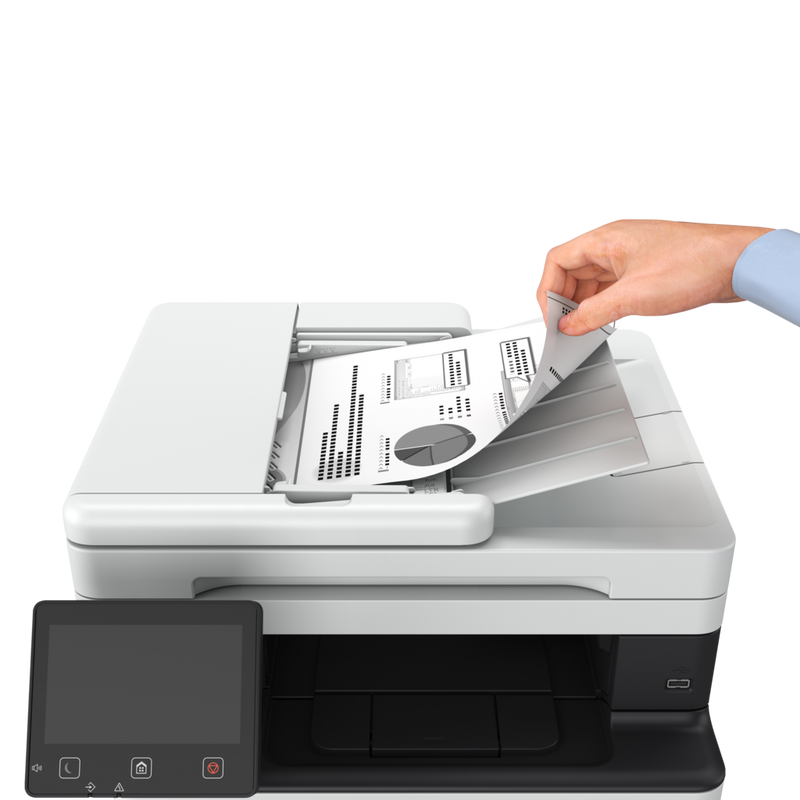 Man adding sheet into printer