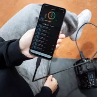 Canon EOS R1 Mirrorless Camera Body Camera connected to a phone