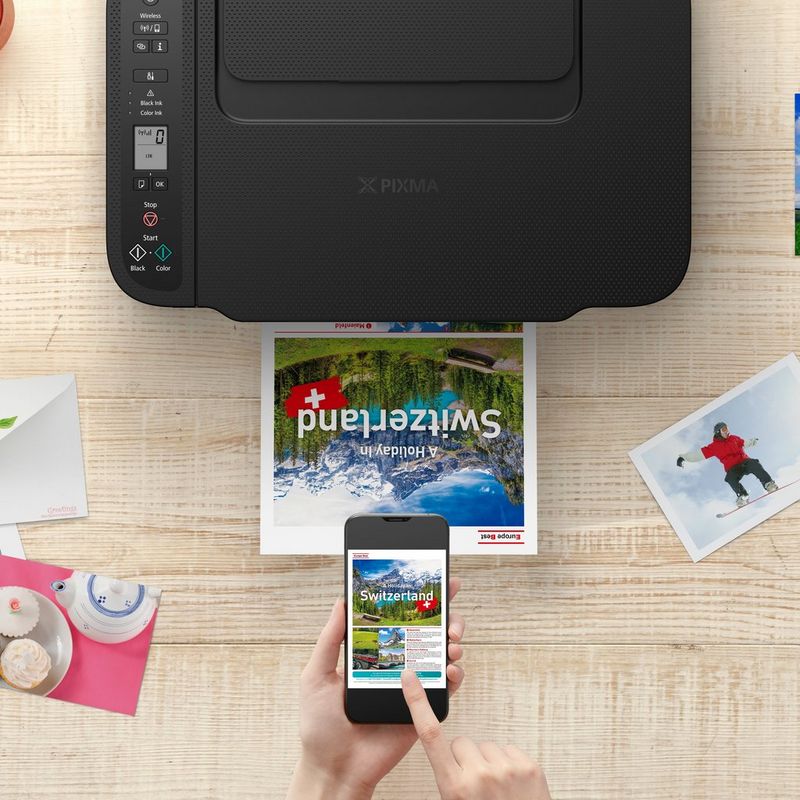 Imprimante multifonction Wi-Fi Canon PIXMA TS3750i, noire Vue de dessus avec téléphone affichant la connectivité