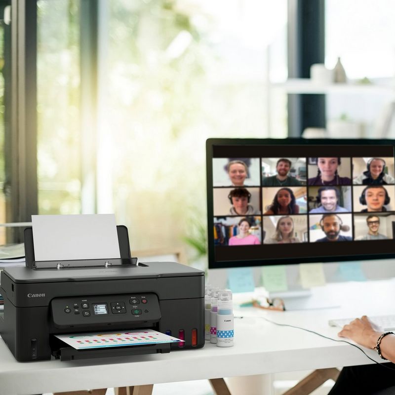 Canon PIXMA G3480 3-in-1 Refillable MegaTank Inkjet Printer Product Women working on computer