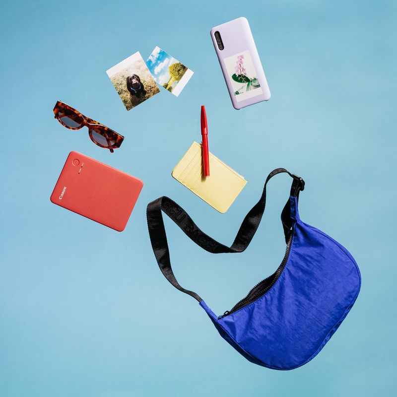 Canon SELPHY QX20 Portable Colour Photo Wireless Printer, Terracotta Red Product showing easy portability