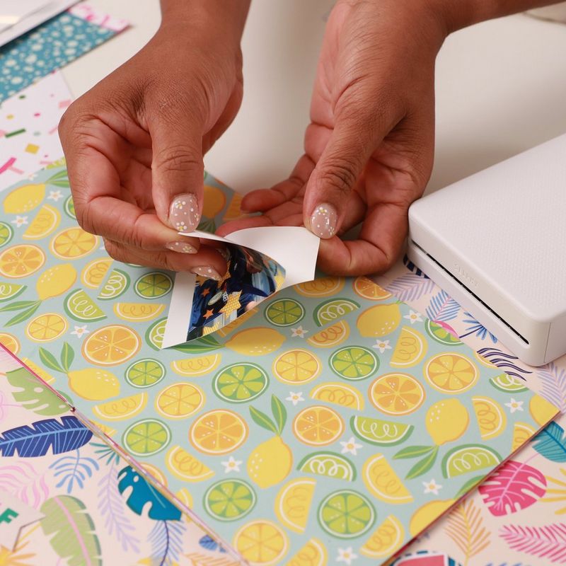 Canon XC-60L-sett med blekk/papir – 54 x 85 mm, 60 ark Rive ut et trykt bilde