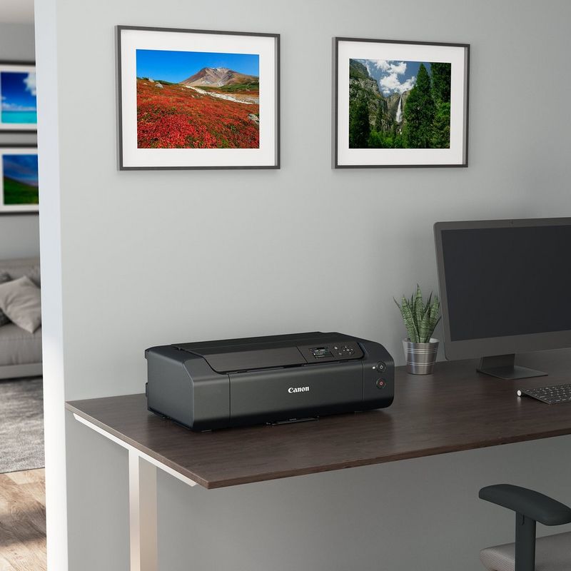 Canon PIXMA PRO-200S A3 Plus Colour Photo Wireless Printer Product Printer kept beside computer
