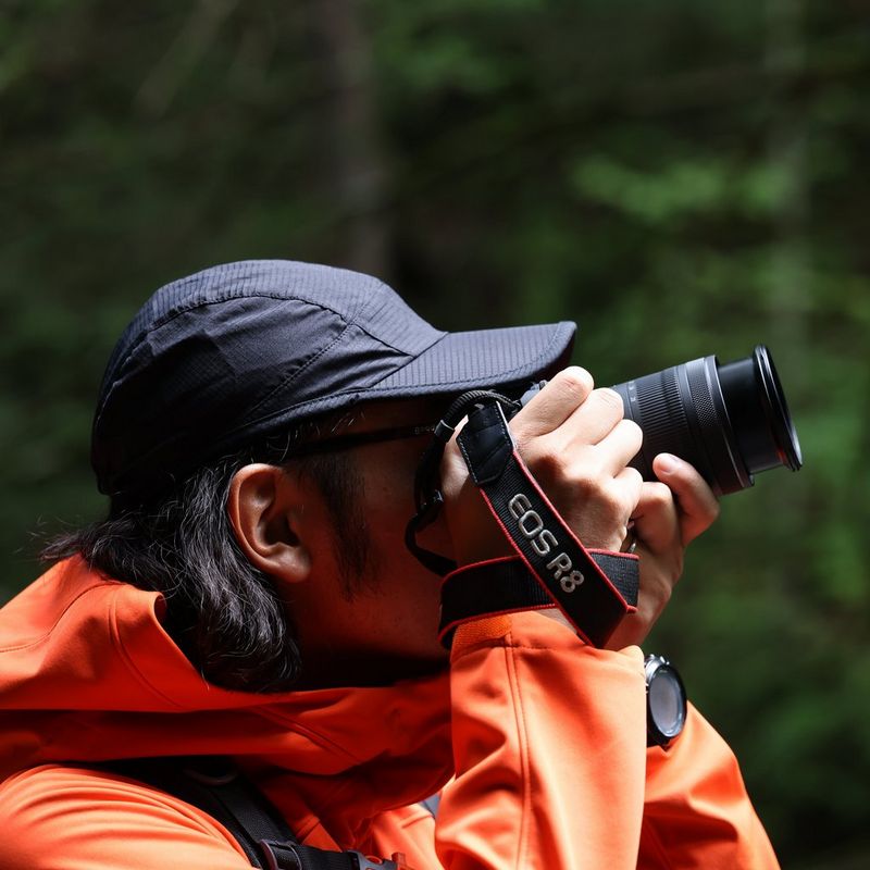 Canon RF 16-28mm F2.8 IS STM Lens Man clicking a photo