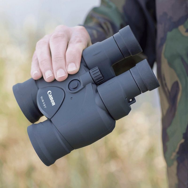Canon 12x36 IS III Binoculars Man Holding Binoculars
