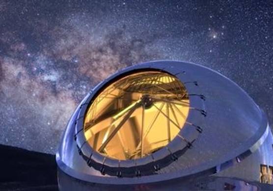 The ‘Thirty Metre Telescope’, located at Mauna Kea, Hawaii, against the backdrop of a clear and starry night.