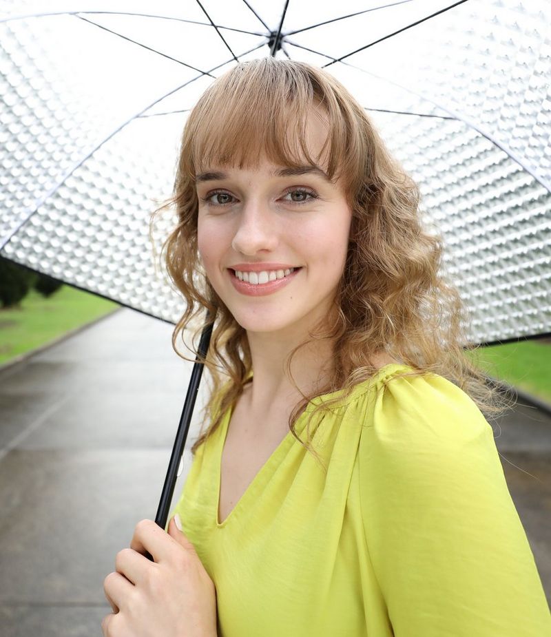 Posed portrait with umbrella