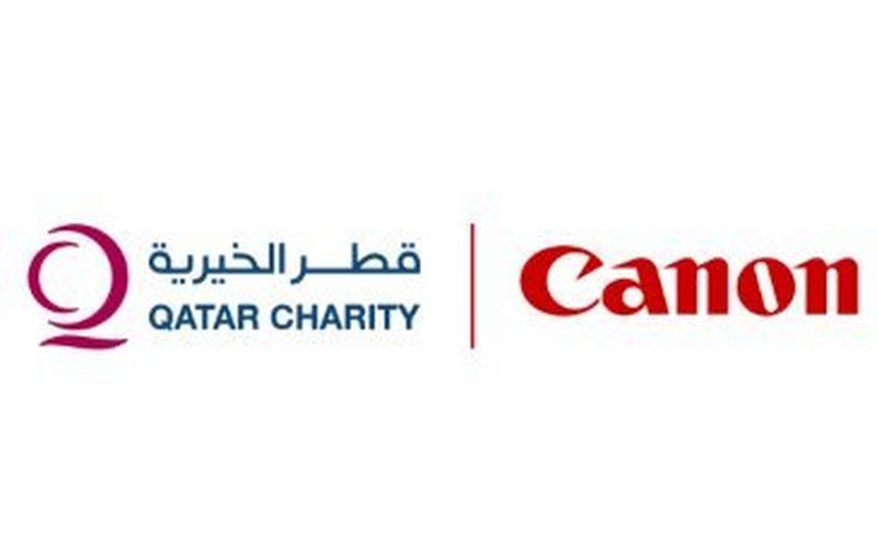 Qatar Charity receives donation from Canon Qatar