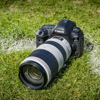 Canon EOS 5D Mark IV Body with Canon Log Camera On Table With Blue Background