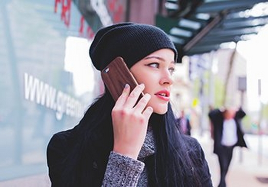 Young woman talking on her smartphone