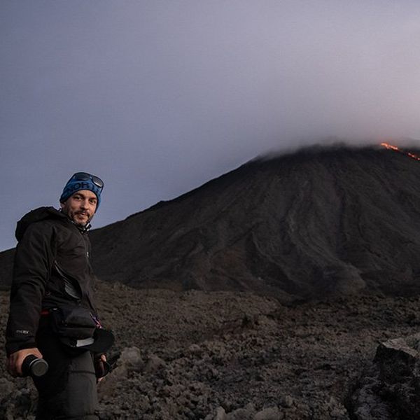 Joel Santos, in front of a volcano