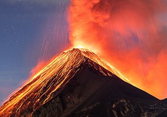 Volcano Fuego spits ash and red-hot lava into the sky.