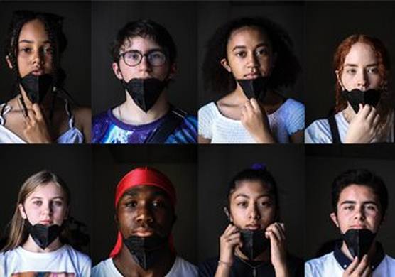 Eight young people, against black backgrounds, all wearing masks to cover their mouths and noses.