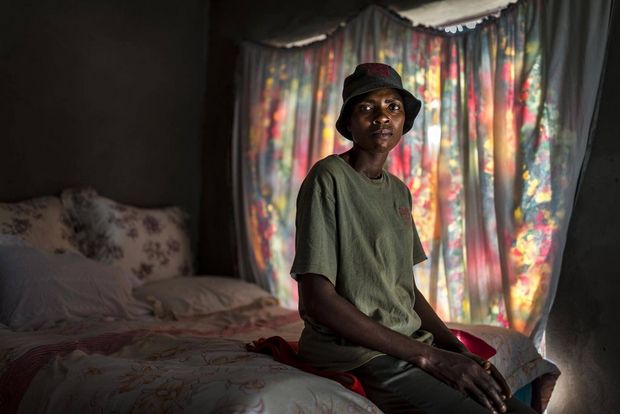 Sabie Game Park Village Police member Nomsa Nduvane, 38, seen in her modest home inside the community of Macacasar, Mozambique/South Africa border.