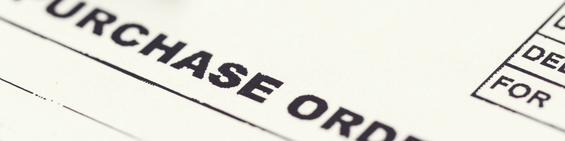 A form with ‘PURCHASE ORDER’ printed across it.