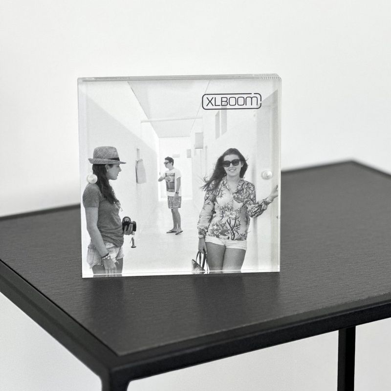 XLBoom 13 x 13 cm Acrylic Magnetic Frame Photo Frame kept on a Table