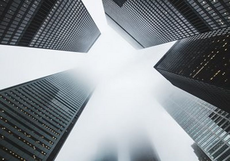 Multiple skyscrapers photographed from the ground.