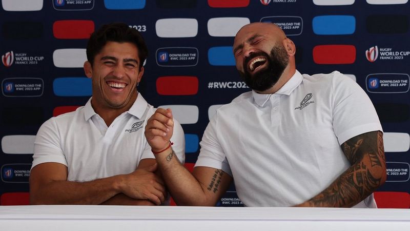 Portugal captain Tomás Appleton and Mike Tadjer laugh during a Rugby World Cup 2023 press conference.