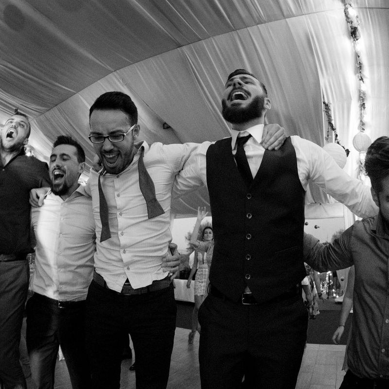 Scenes at Romanian wedding - Groom and friends dancing - taken with a EOS 5D Mark IV